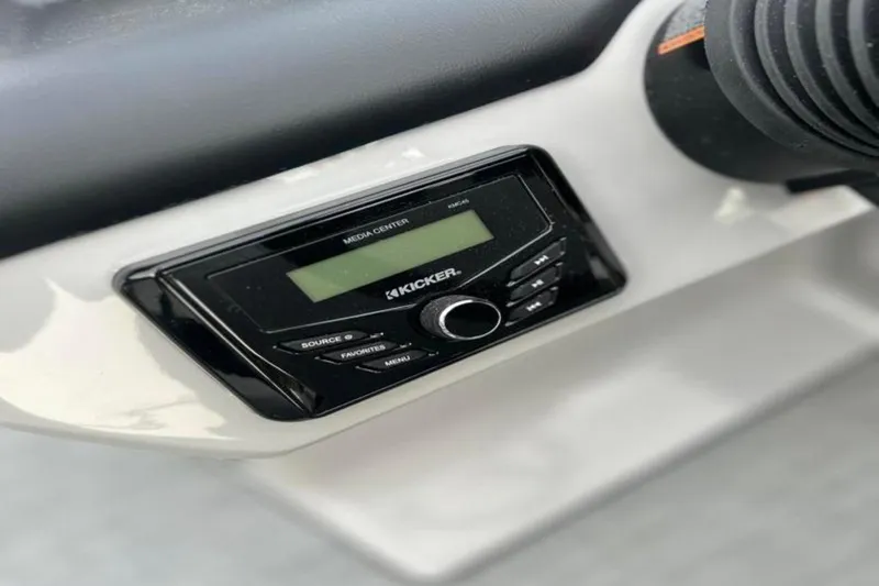 Slide: The Image of Kicker media center in 2026 Lowe LS 210 WT boat dashboard. - 33