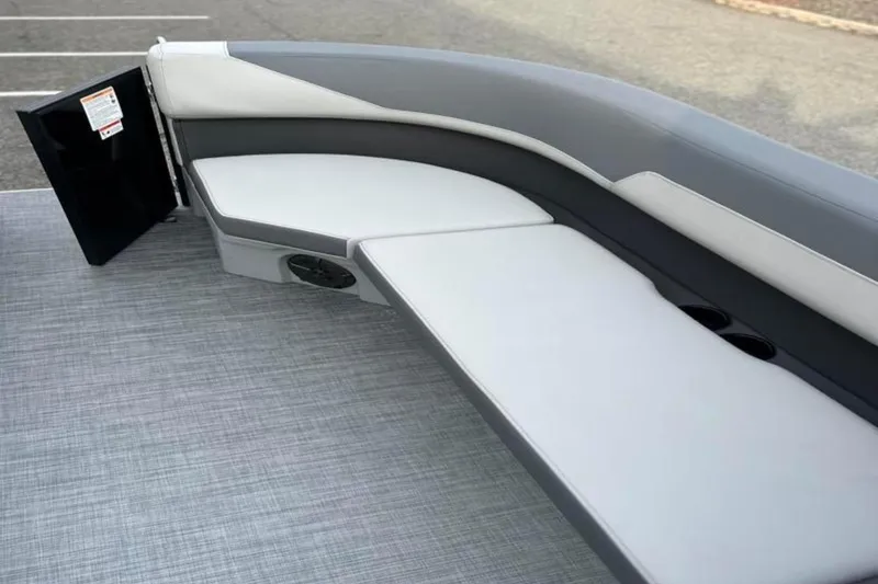 Slide: The Image of 2026 Lowe LS 210 WT boat interior with gray seating and cup holders. - 37
