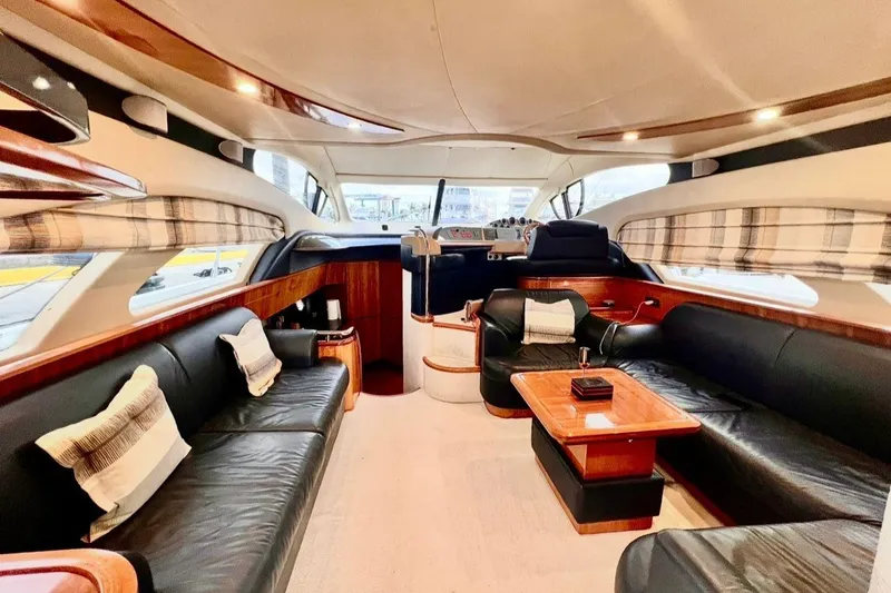 Slide: The Image of Luxurious interior of 2006 Azimut 50 Fly yacht with elegant seating and modern design. - 10