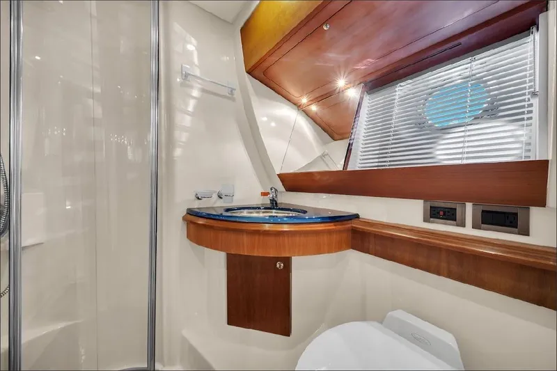 Slide: The Image of Luxurious bathroom interior of 2006 Azimut 50 Fly yacht with modern fixtures. - 13