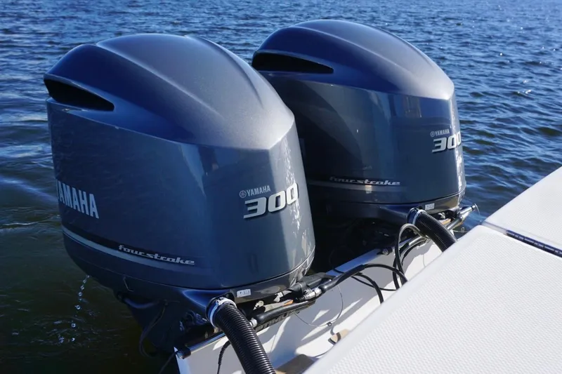 Slide: The Image of Twin Yamaha 300 outboard engines on a 2018 Regulator 28 boat. - 13