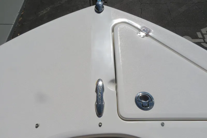 Slide: The Image of 2015 Sea Fox 226 Traveler boat deck with chrome fittings and textured surface. - 15