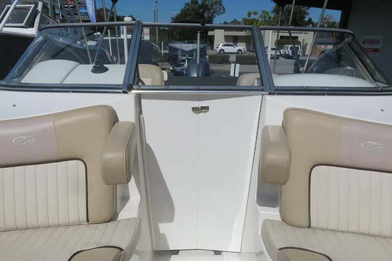 Slide: The Image of 2015 Sea Fox 226 Traveler boat interior with beige seating and windshield. - 17