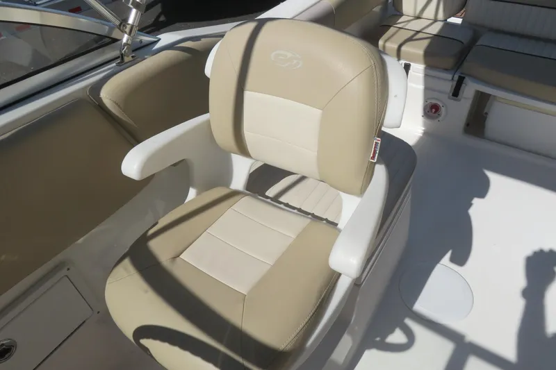 Slide: The Image of 2015 Sea Fox 226 Traveler boat interior with beige seating. - 19