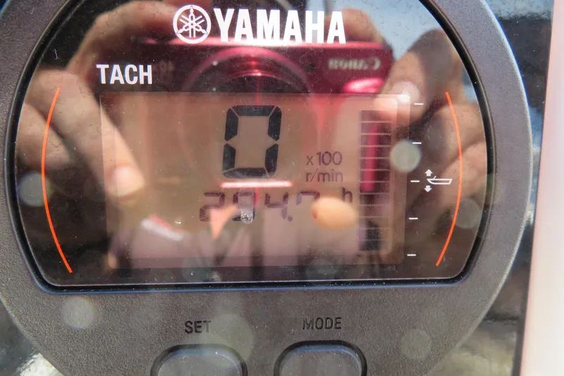 Slide: The Image of Yamaha tachometer displaying 274.7 hours on a 2015 Sea Fox 226 Traveler boat. - 22