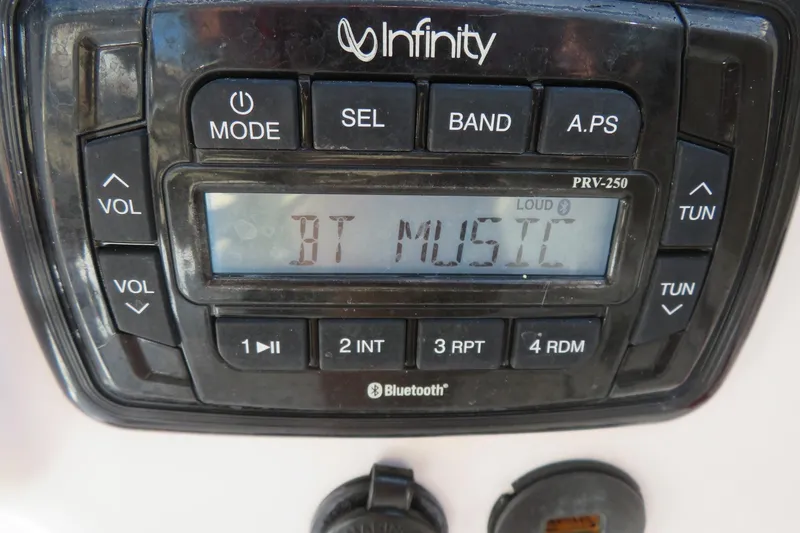 Slide: The Image of Infinity PRV-250 stereo system displaying "BT MUSIC" on a 2015 Sea Fox 226 Traveler. - 24