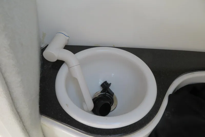 Slide: The Image of Small sink with faucet in 2015 Sea Fox 226 Traveler boat. - 29