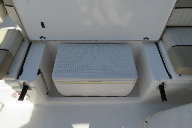 Slide: The Image of 2015 Sea Fox 226 Traveler boat interior with Igloo cooler storage compartment. - 37