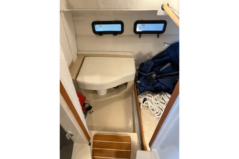 Slide: The Image of 2016 Ranger Tugs R-31 CB interior cabin with storage and seating area. - 22