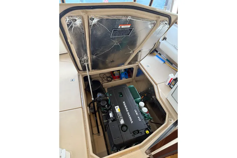 Slide: The Image of Engine compartment of 2016 Ranger Tugs R-31 CB with Volvo Penta D4-300 engine. - 27