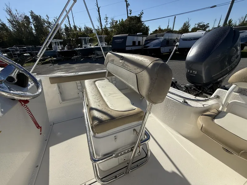 Slide: The Image of 2014 Key West 186br boat interior with seating and Yamaha 115 outboard motor. - 3