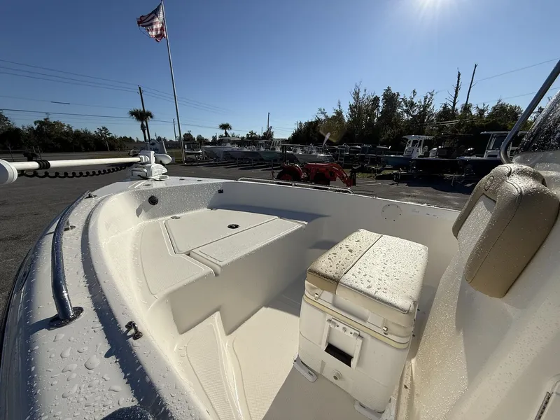 Slide: The Image of 2014 Key West 186br boat interior with wet seats and American flag in background. - 8