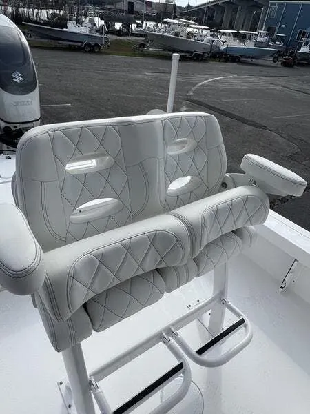 Slide: The Image of 2024 Blazer GTS 2550 BAY boat with luxurious white leather seating and diamond stitching. - 6