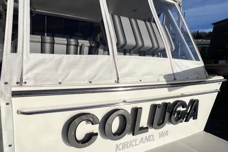 Slide: The Image of 1999 Pacific Mariner 65 Motoryacht with "COLUGA" name, docked in Kirkland, WA. - 13