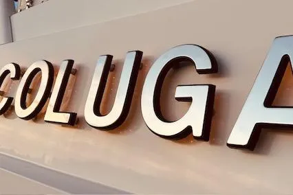 Slide: The Image of Close-up of "COLUGA" lettering on 1999 Pacific Mariner 65 Motoryacht. - 14