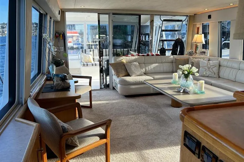 Slide: The Image of Luxurious interior of a 1999 Pacific Mariner 65 Motoryacht with elegant seating and decor. - 30