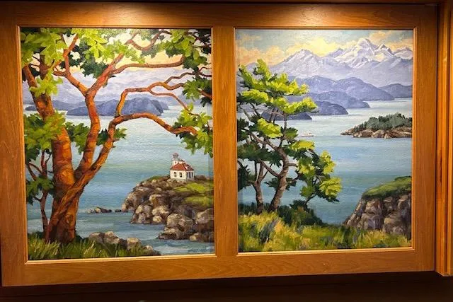 Slide: The Image of Painting of a coastal landscape with trees, mountains, and a lighthouse, framed in wood. - 34