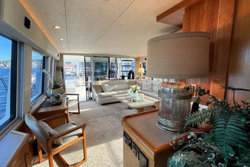 Slide: The Image of Luxurious interior of a 1999 Pacific Mariner 65 Motoryacht with elegant furnishings and scenic views. - 35