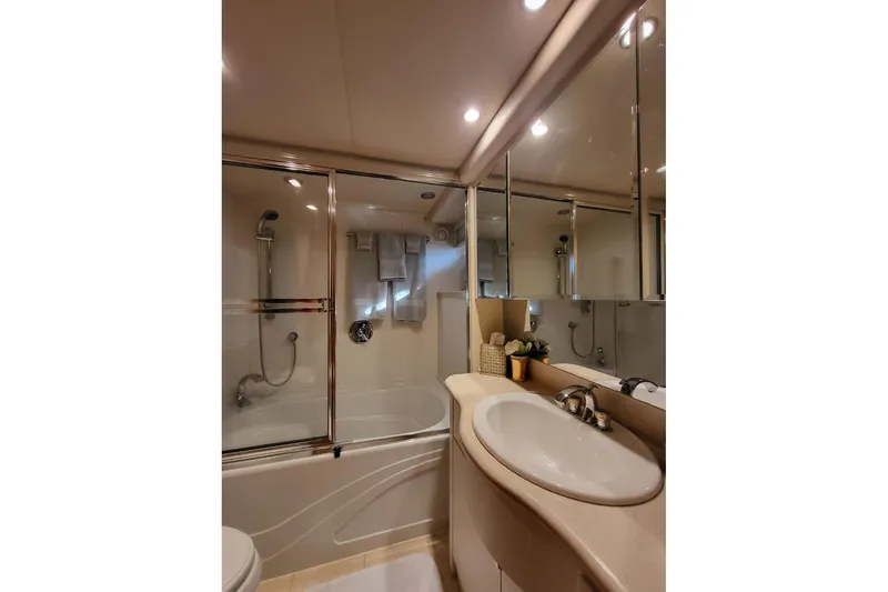 Slide: The Image of Luxurious bathroom in 1999 Pacific Mariner 65 Motoryacht with shower and vanity. - 53