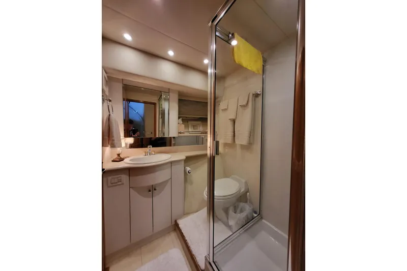 Slide: The Image of Luxurious bathroom in 1999 Pacific Mariner 65 Motoryacht with shower and vanity. - 66