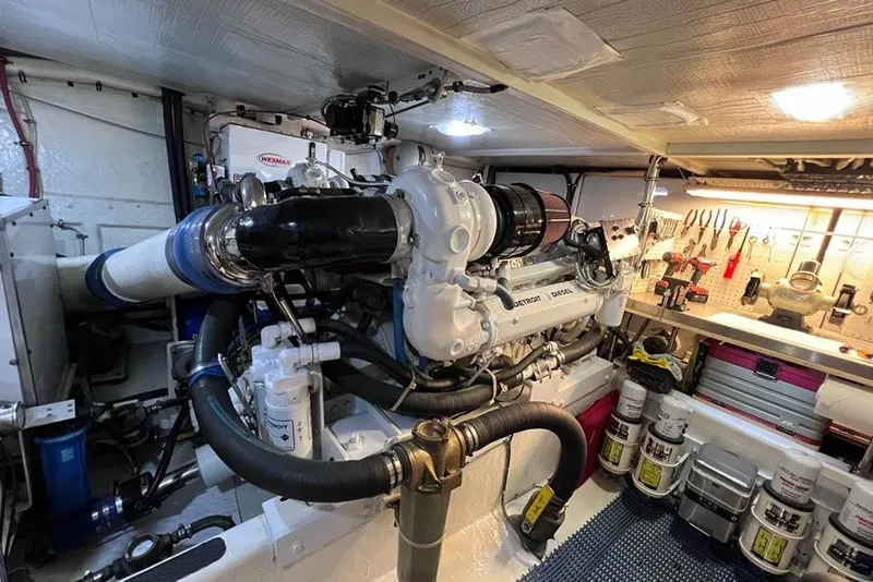 Slide: The Image of Engine room of 1999 Pacific Mariner 65 Motoryacht with tools and equipment. - 73