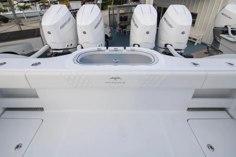 Slide: The Image of 2026 Invincible 38 Catamaran with four Mercury outboard engines, featuring a sleek design. - 19