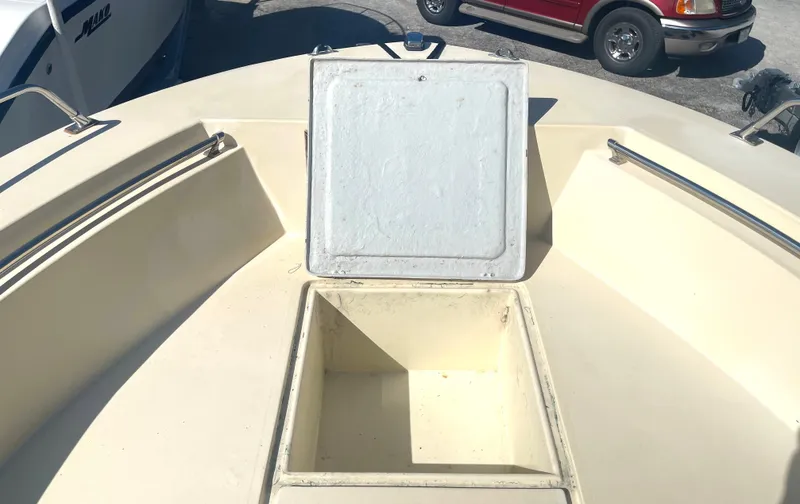 Slide: The Image of Open storage compartment on 1986 Gulf Stream Yachts custom boat deck. - 13