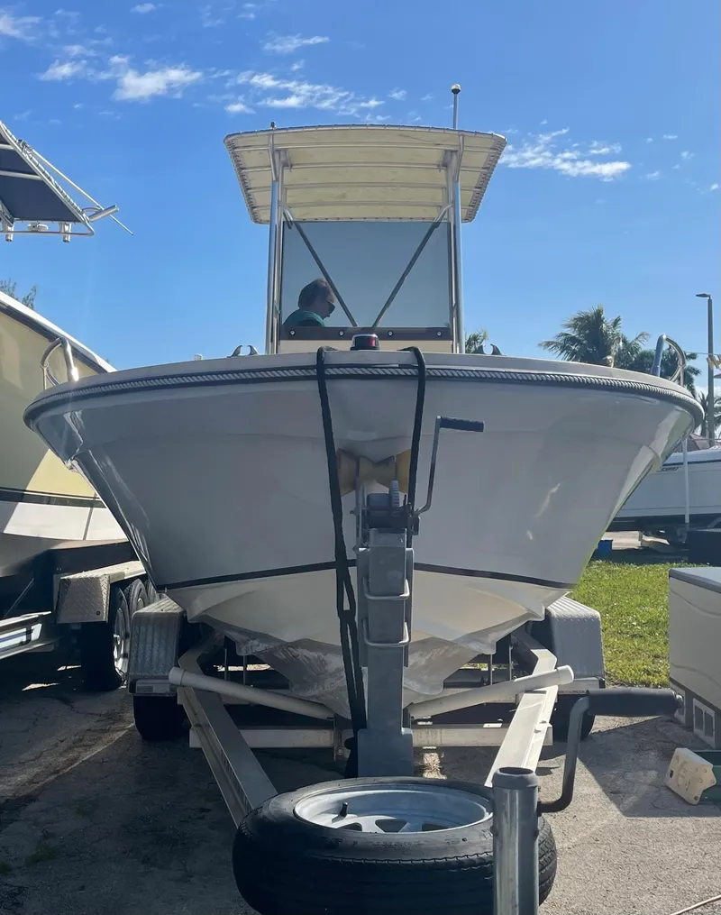 Slide: The Image of 1986 Gulf Stream Yachts custom boat on a trailer under a clear blue sky. - 3