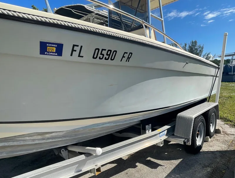 Slide: The Image of 1986 Gulf Stream Yachts custom boat on trailer with Florida registration. - 6