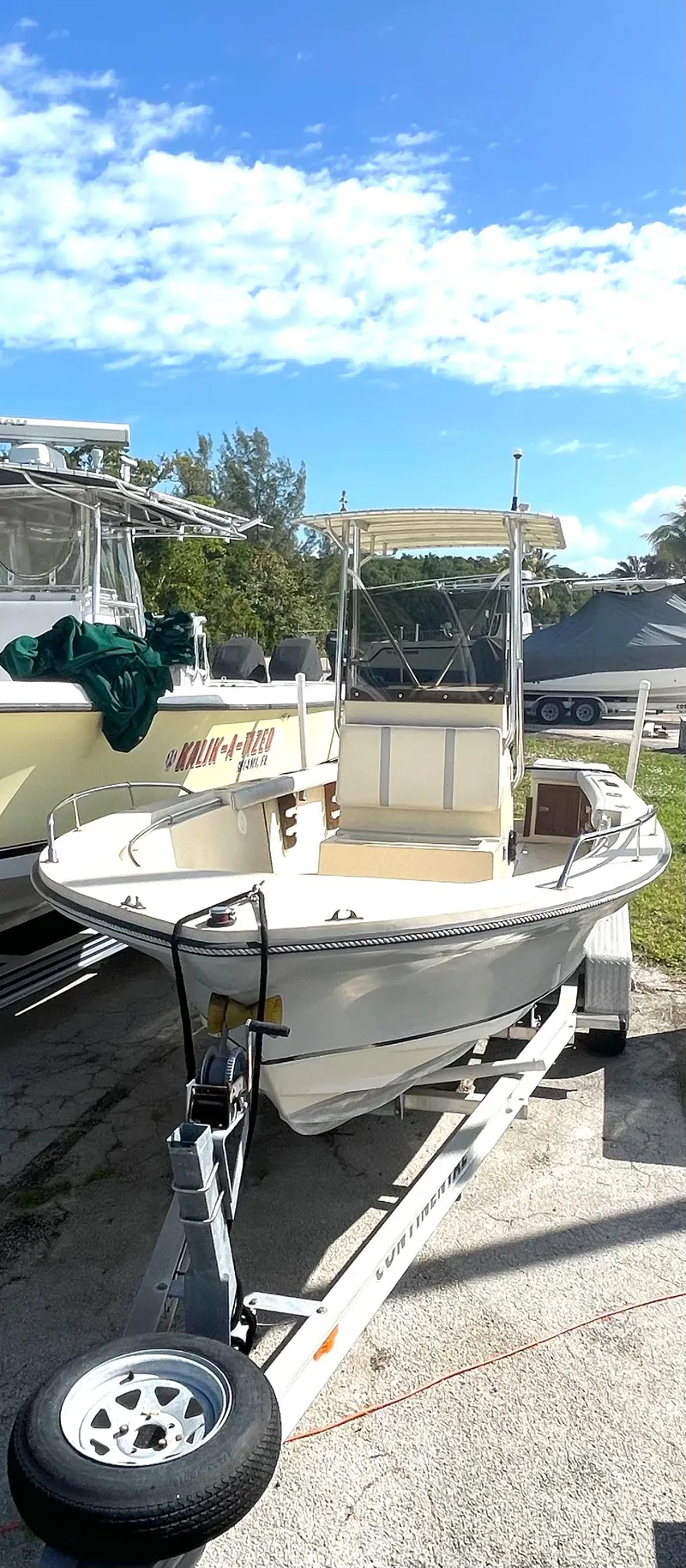 Slide: The Image of 1986 Gulf Stream Yachts custom boat on trailer under clear sky. - 9