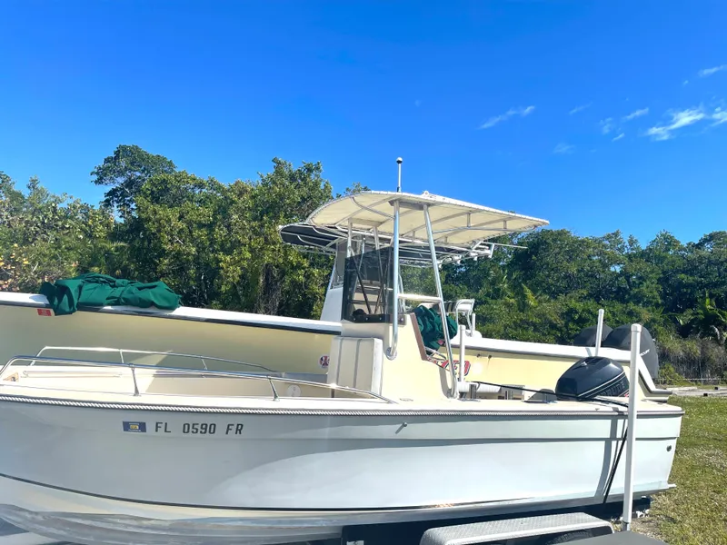 The Image of 1986 Gulf Stream Yachts custom boat on trailer, side view, clear sky background. - 0