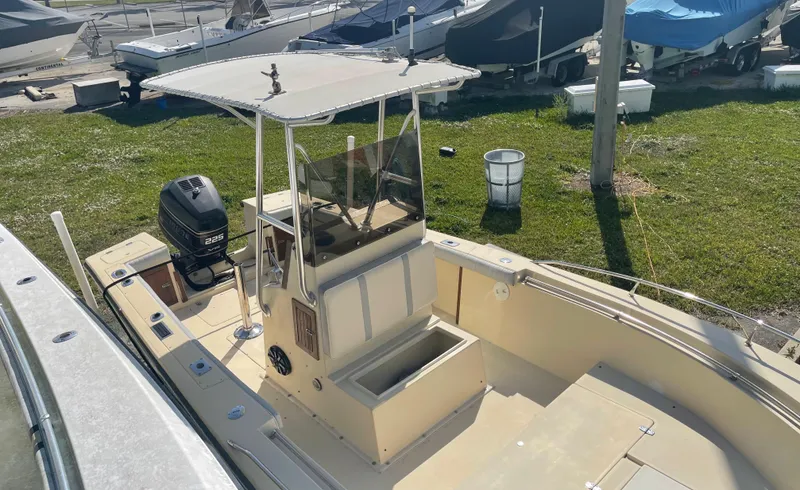 Slide: The Image of 1986 Gulf Stream Yachts custom boat with center console and outboard motor. - 10