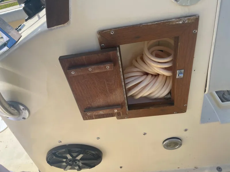 Slide: The Image of Wooden storage compartment on a 1986 Gulf Stream Yachts custom model. - 30