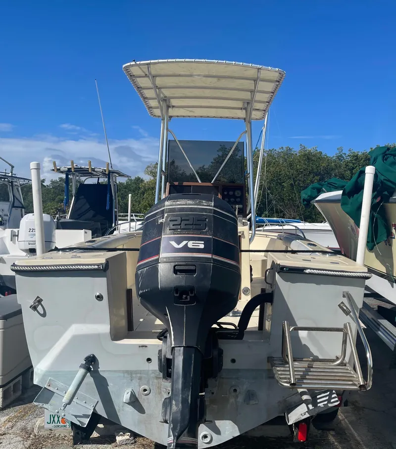Slide: The Image of 1986 Gulf Stream Yachts custom boat with V6 engine docked at marina. - 31