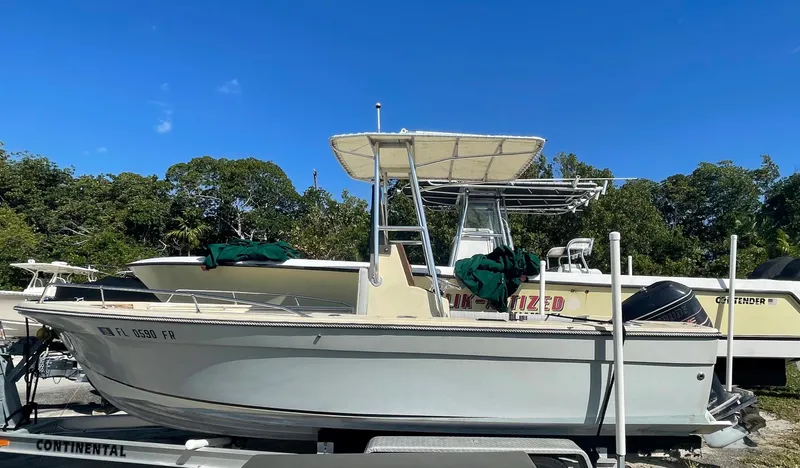 Slide: The Image of 1986 Gulf Stream Yachts custom boat on trailer under clear blue sky. - 7