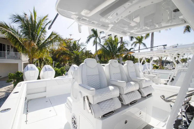 Slide: The Image of Control panel of 2026 Invincible 36 Catamaran featuring Garmin and Icom electronics. - 20