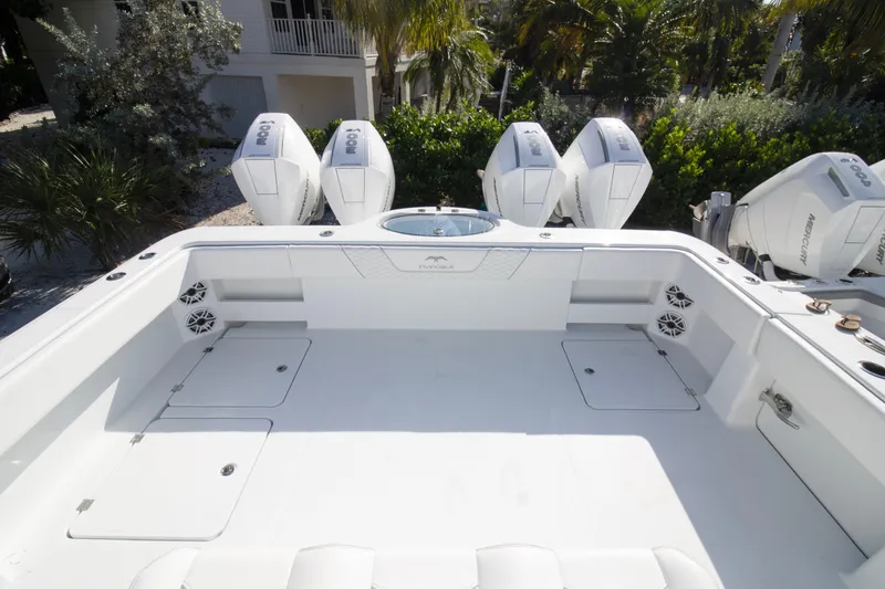 Slide: The Image of 2026 Invincible 36 Catamaran with sleek white design, spacious deck, and modern features. - 25
