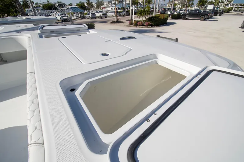 Slide: The Image of 2026 Invincible 36 Catamaran interior with sleek design and multiple cup holders. - 6