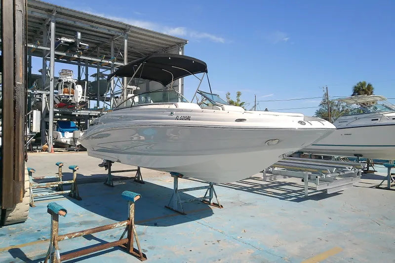 The Image of 2017 Crownline Eclipse E6 XS boat on dry dock under clear blue sky. - 0