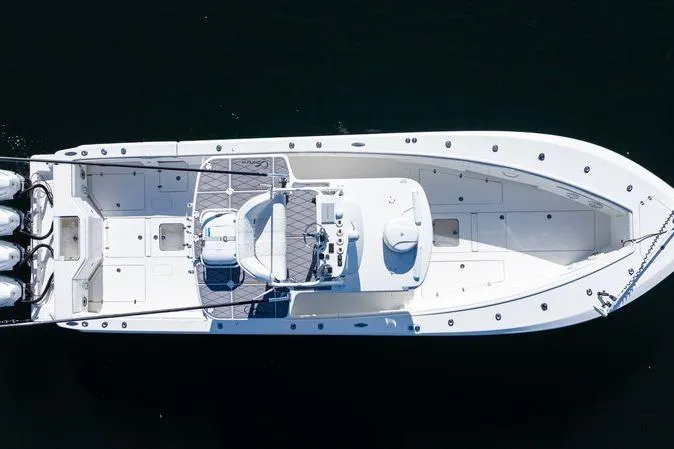Slide: The Image of Top view of a 2016 SeaVee 390Z boat with multiple outboard engines. - 10