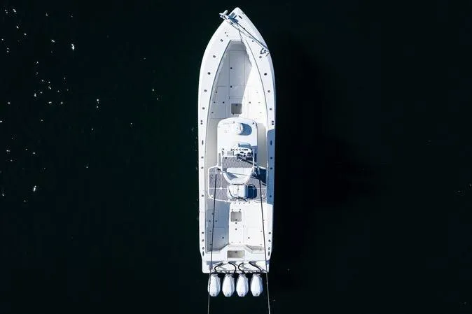 Slide: The Image of Overhead view of 2016 SeaVee 390Z boat on dark water. - 11