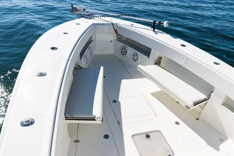 Slide: The Image of 2016 SeaVee 390Z boat interior with seating, speakers, and ocean view. - 19