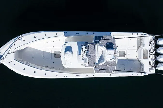 Slide: The Image of Overhead view of 2016 SeaVee 390Z boat with spacious deck and multiple outboard engines. - 9