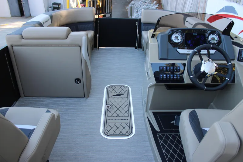 Slide: The Image of Interior of 2026 Starcraft SLS 3 boat with modern dashboard and seating. - 12