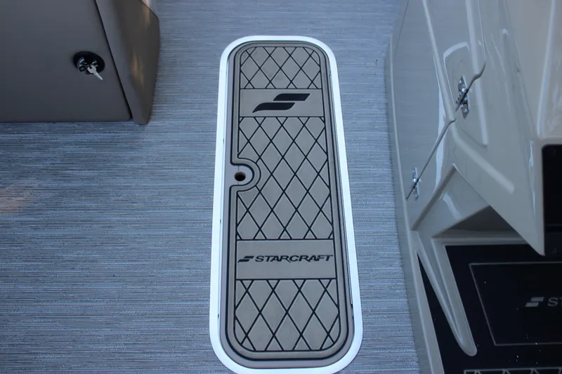 Slide: The Image of 2026 Starcraft SLS 3 boat floor with branded hatch cover and sleek design. - 20