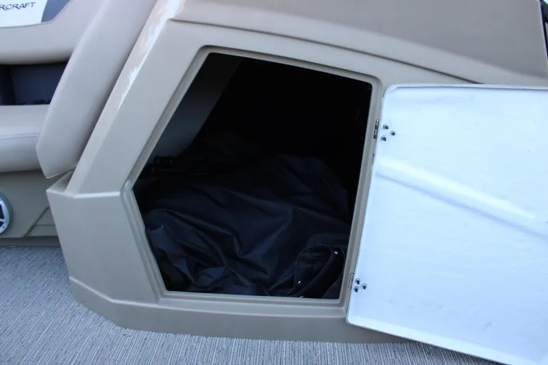 Slide: The Image of Open storage compartment on 2026 Starcraft SLS 3 boat, showing interior space. - 22