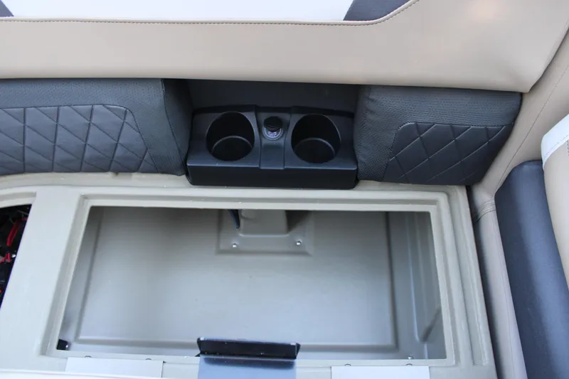 Slide: The Image of Interior of 2026 Starcraft SLS 3 with storage compartment and cup holders. - 31