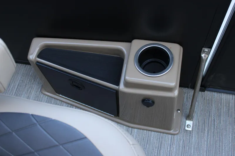 Slide: The Image of 2026 Starcraft SLS 3 boat interior with cup holder and storage compartment. - 33
