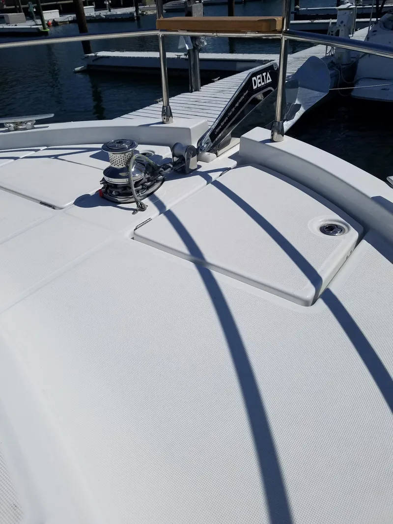 Slide: The Image of 2019 Beneteau Swift Trawler 35 deck with anchor and winch system. - 16