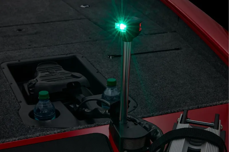 Slide: The Image of Interior of 2026 Tracker Pro Team 190 boat with NOCO Genius battery charger. - 14